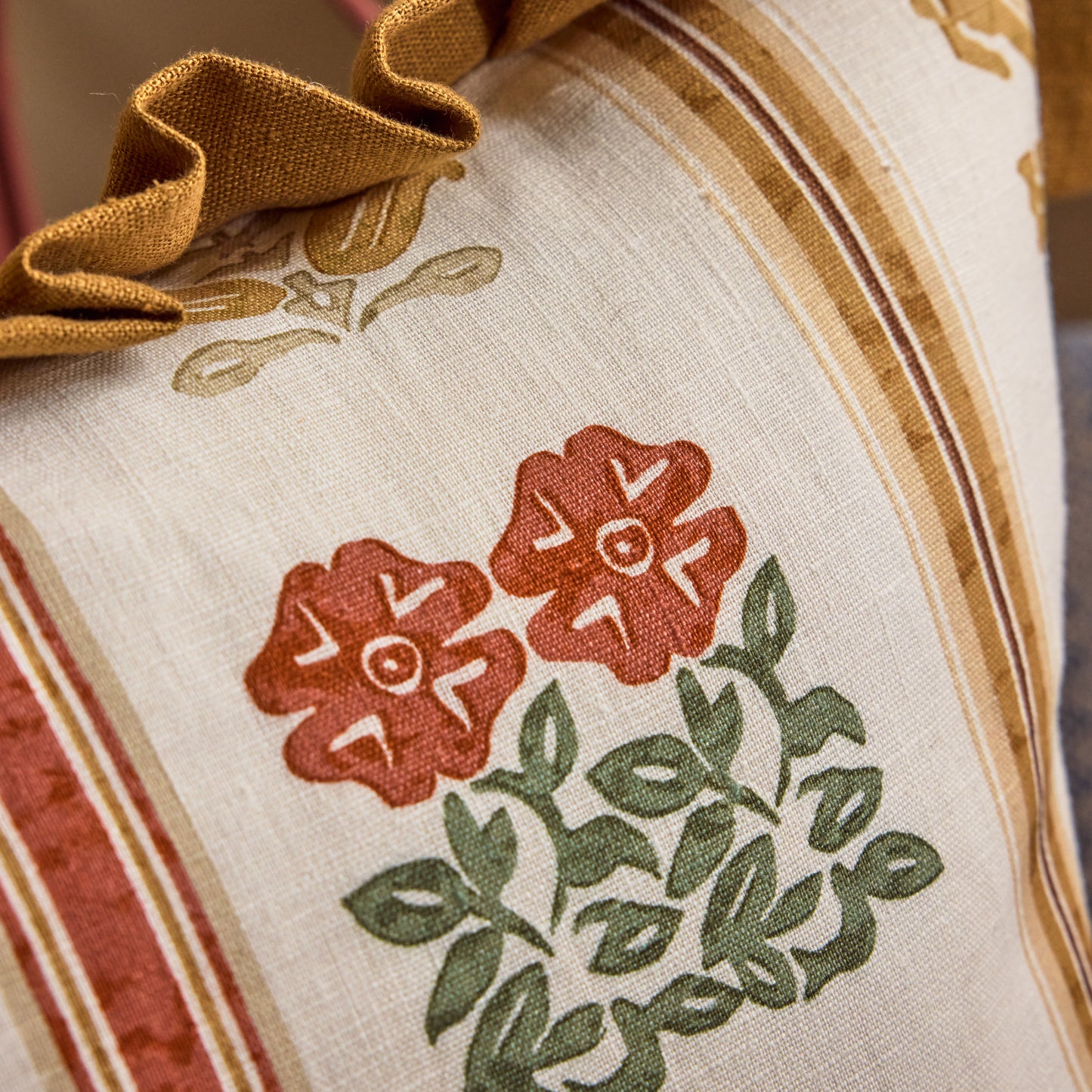 Folkloric Floral Print Cushion in Amber with Old Gold Frill