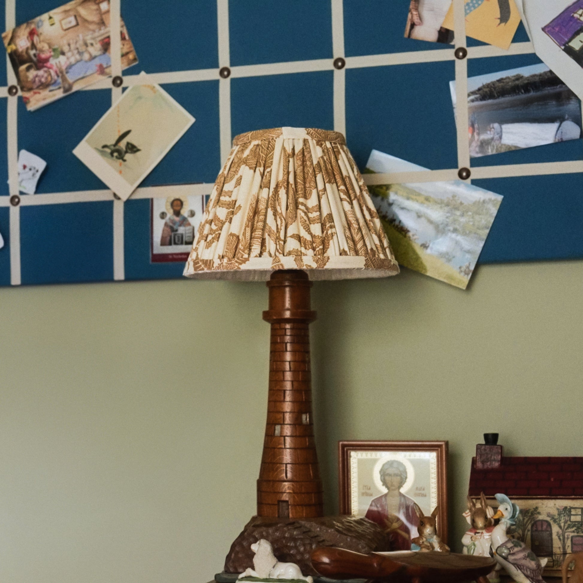 Hand pleated lampshade in cape botanical  old gold