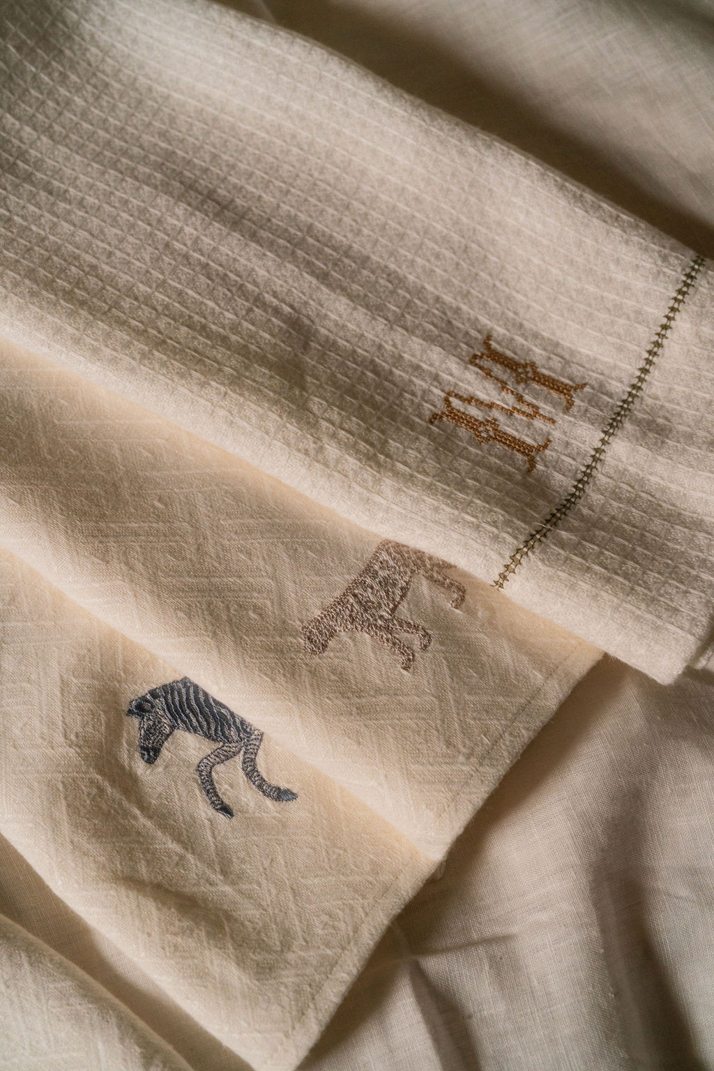Liège Hand Towel in Ivory White Waffle with Olive Green Hemstitch