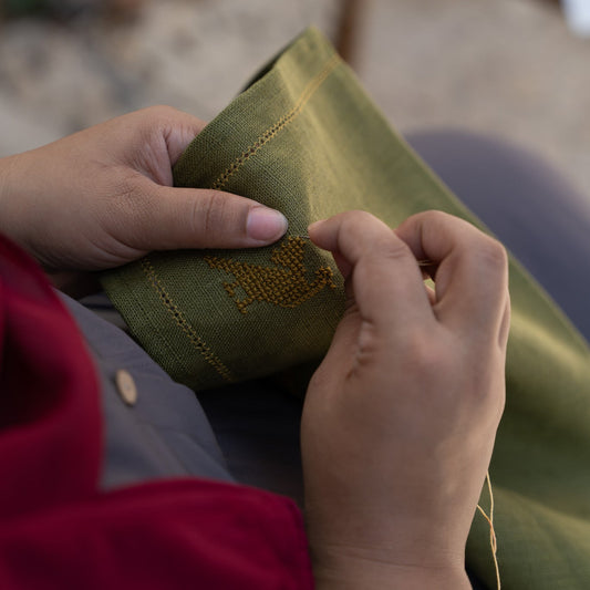 Set of 2 Fern Green Napkins with Ochre Hemstitch and Palestinian Ochre Bird Hand Embroidery