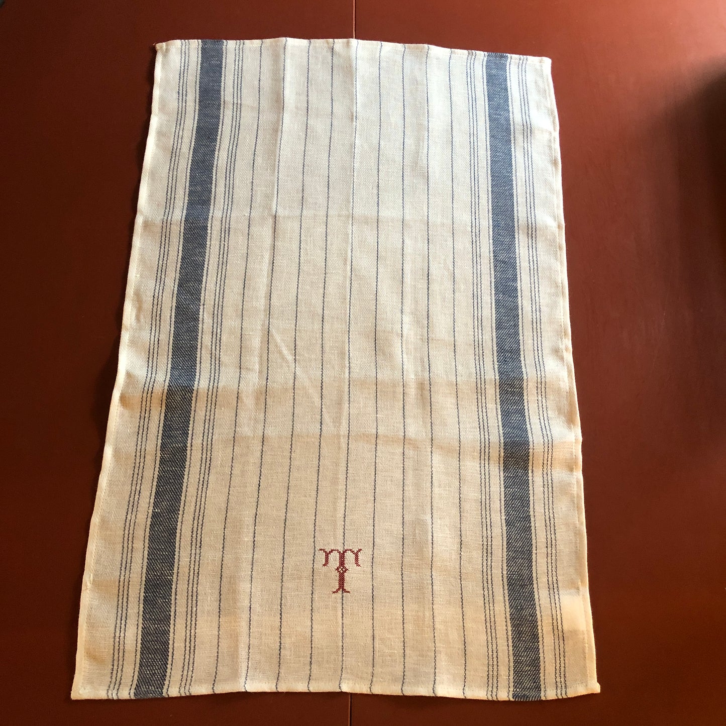 French Blue Stripe Kitchen Towel With "T" Embroidery in Volga Red Cross Stitch