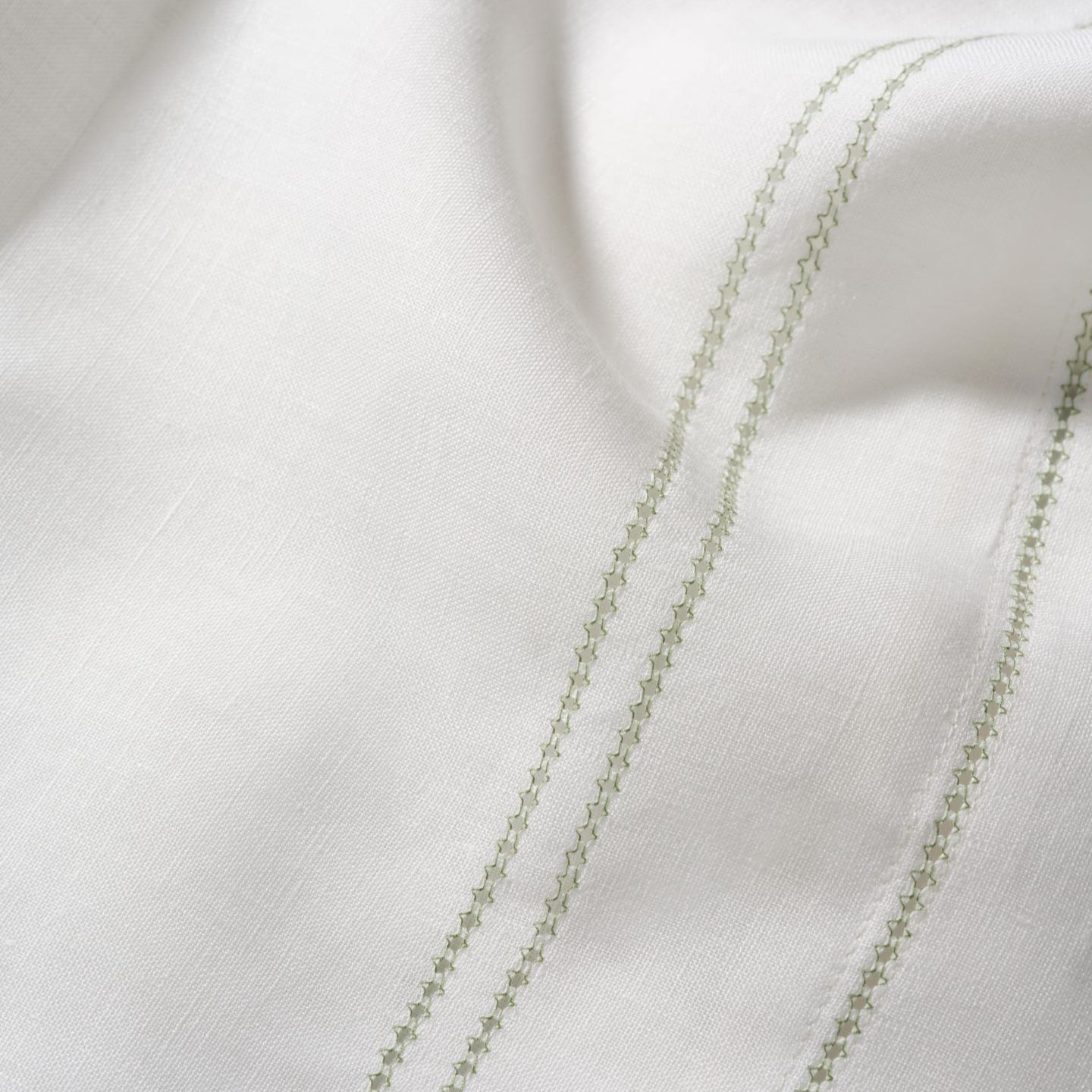 Botanical green hemstitch detail