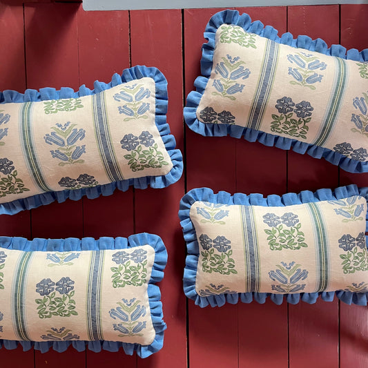 Floral print cushion with cornflower blue frill