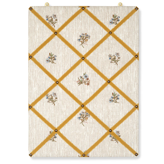bulletin board in posy pinstripe printed linen finished with ochre ribbon and brass studs