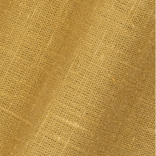 detail of light weight plain linen in old gold colour