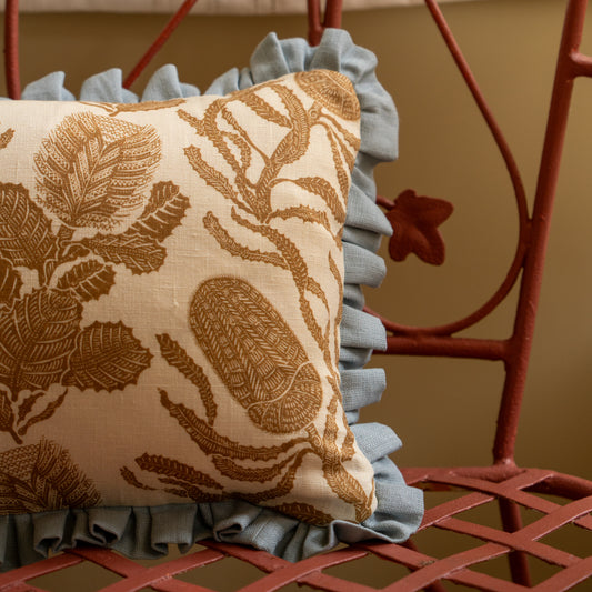 Cape Botanical Print Cushion in Old Gold with Porcelain Blue Frill