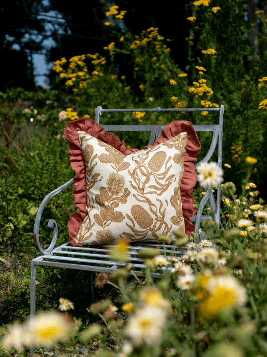 Cape Botanical in Old Gold Cushion with Sirin Terracotta Frill