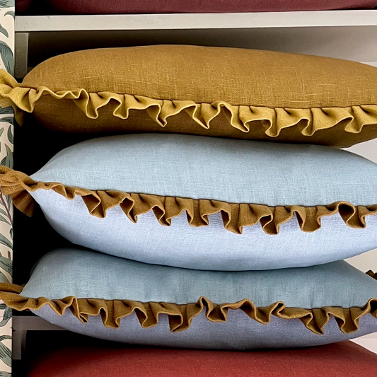 parma grey cushion with antique gold frill edge