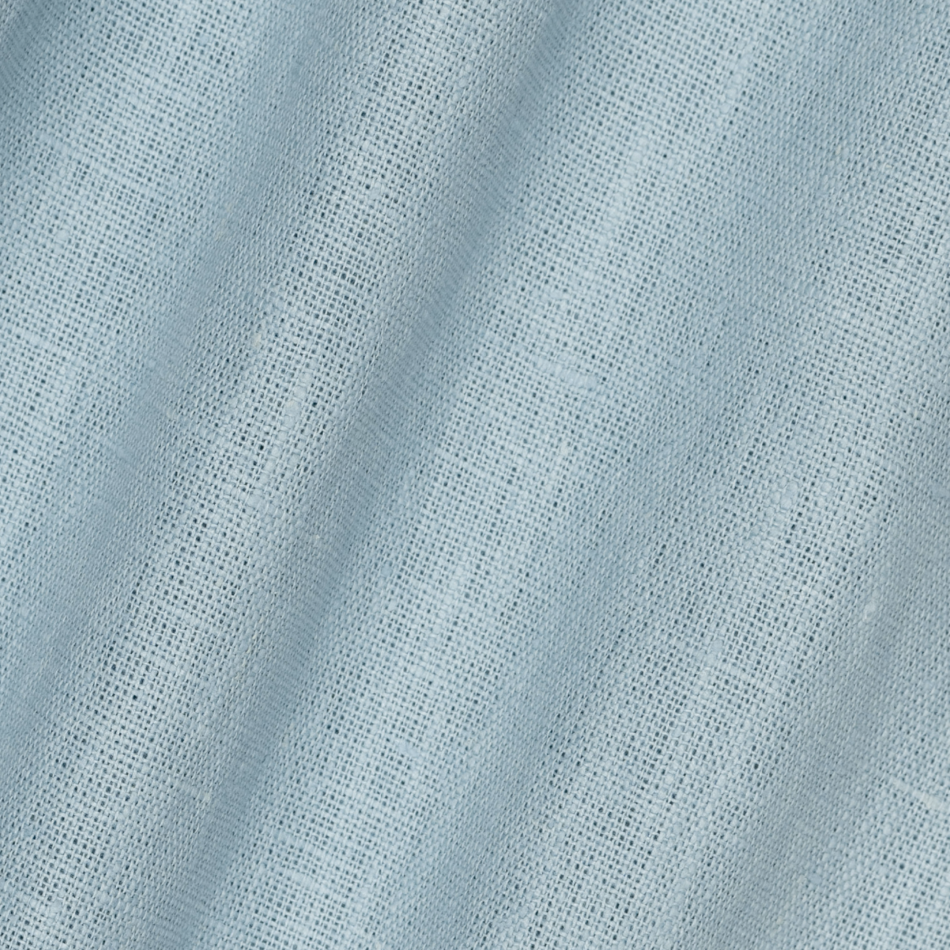 detail image of light weight plain linen in porcelain blue