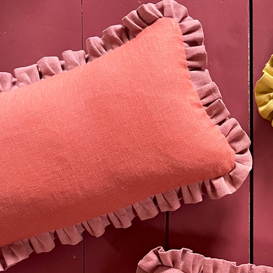 terracotta colour cushion with sirin terracotta frill