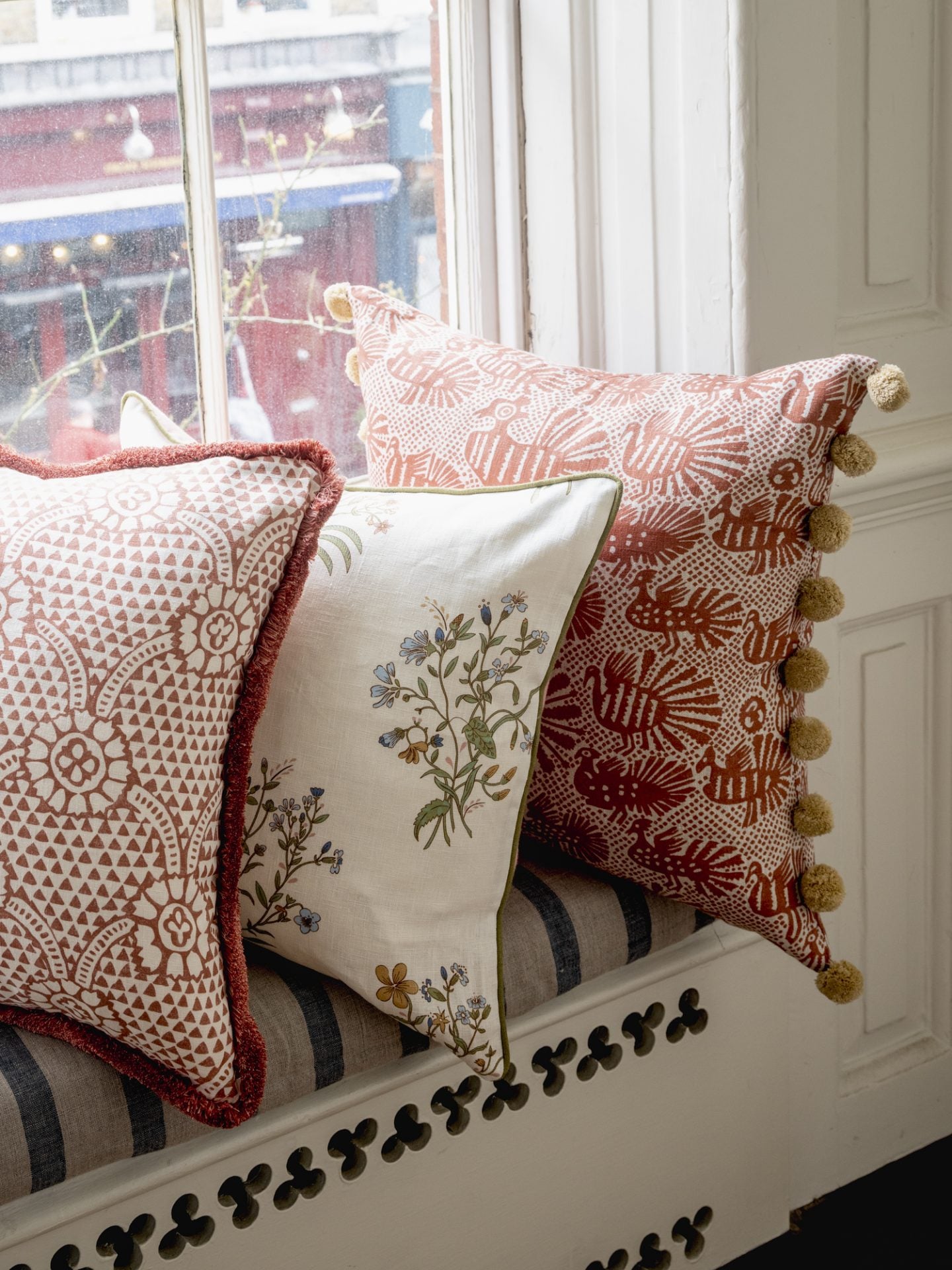 Sirin Print Cushion in Terracotta with Bobble Trim