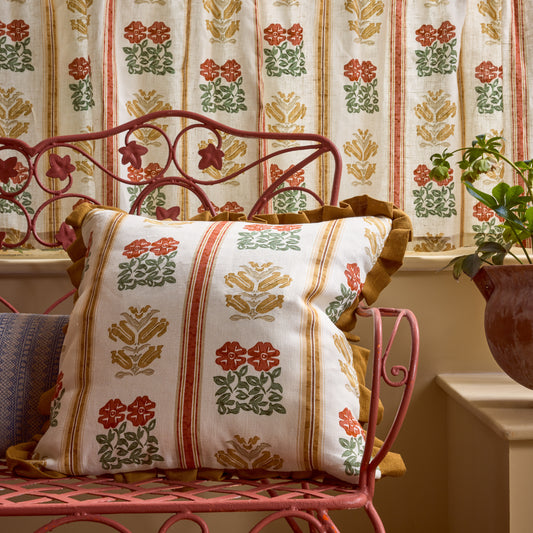Folkloric Floral Print Cushion in Amber with Old Gold Frill