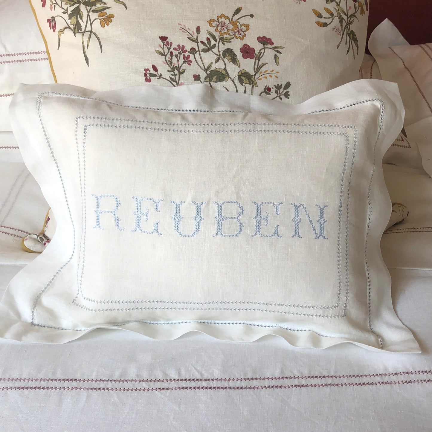 Boudoir Pillow with Hemstitch in Chambray Blue and "Reuben" Embroidery In Pastel Blue Cross Stitch