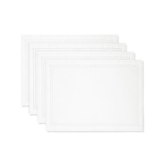 Set of white placemats on a white background