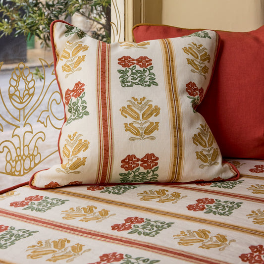 Folkloric Floral Print Cushion in Amber with Terracotta Piping