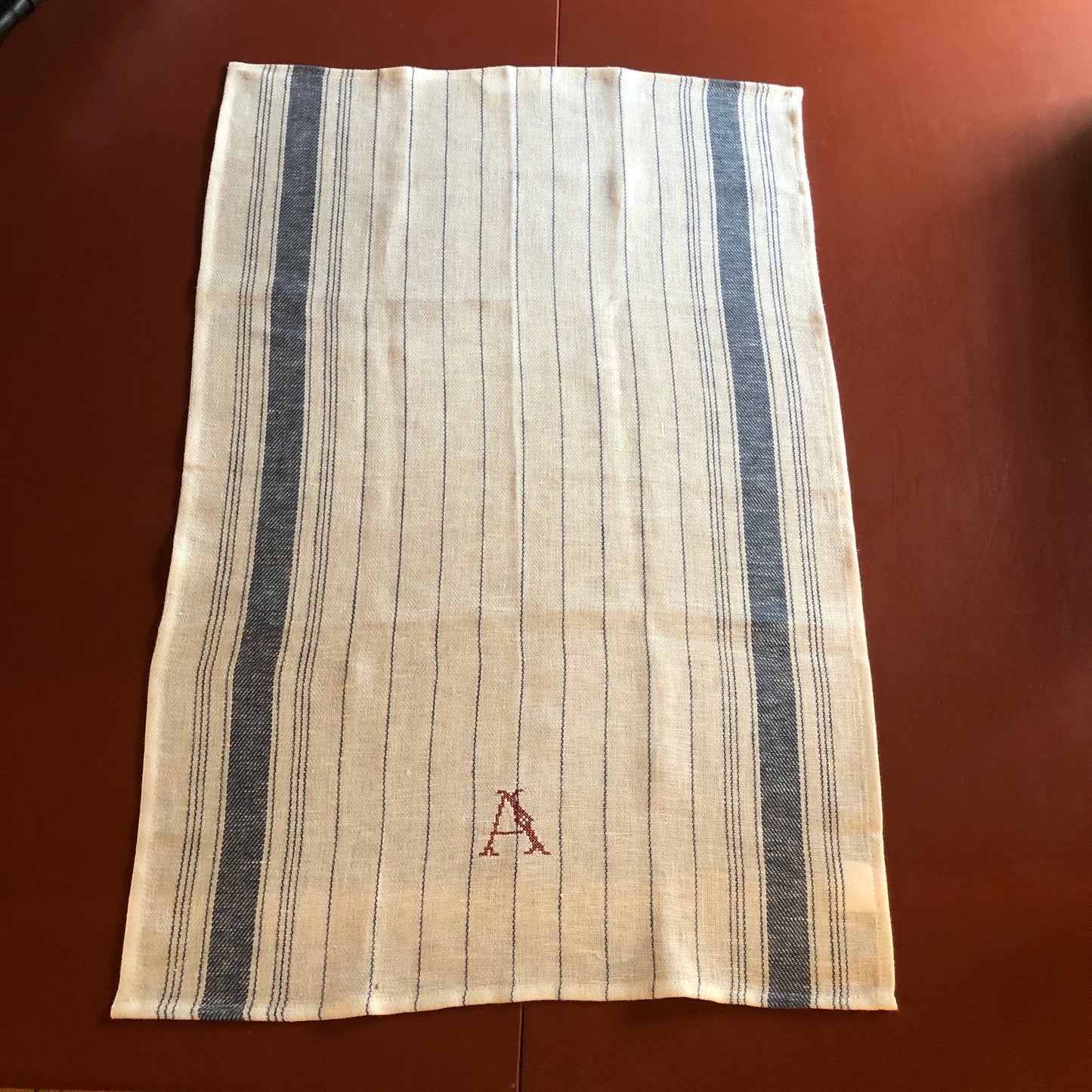 French Blue Stripe Kitchen Towel With "A" Embroidery in Volga Red Cross Stitch