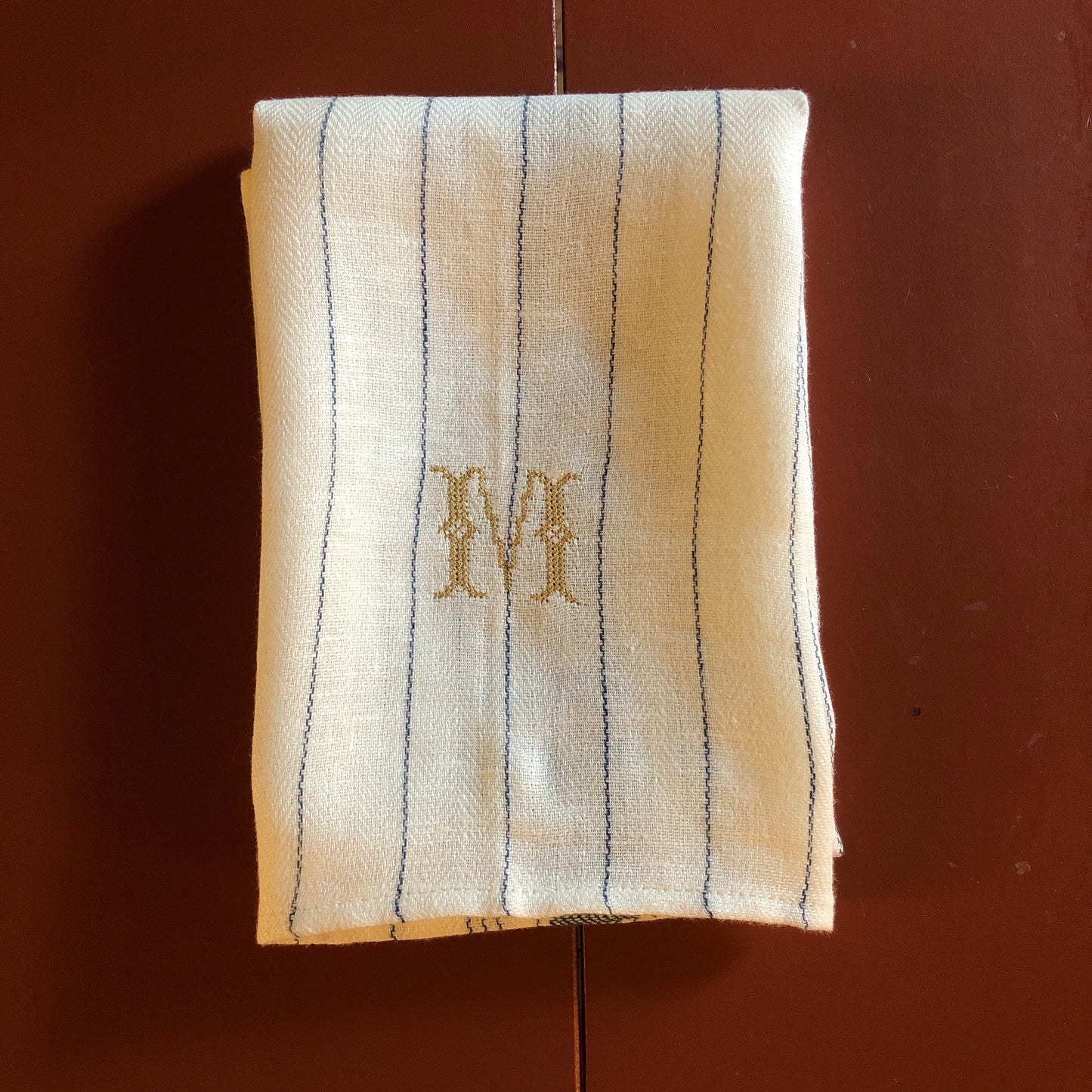 French Blue Stripe Kitchen Towel With "M" Embroidery in Antique Gold Cross Stitch
