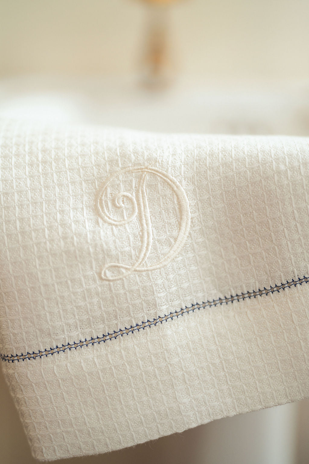 Liège Hand Towel in Ivory White Waffle with Indigo Hemstitch